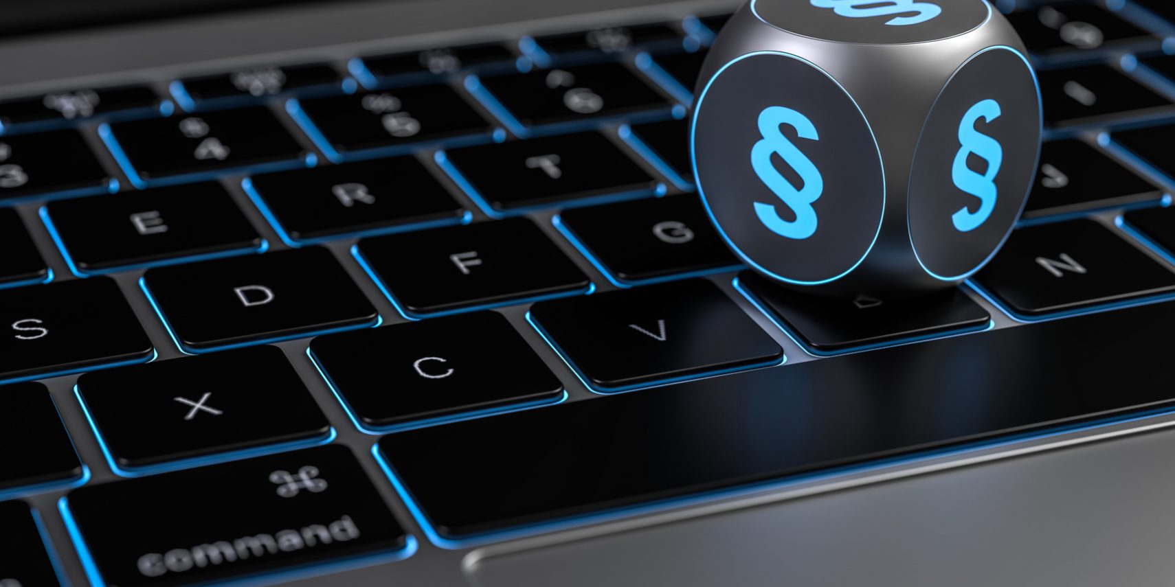 Würfel mit Paragraph Symbol auf Tastatur